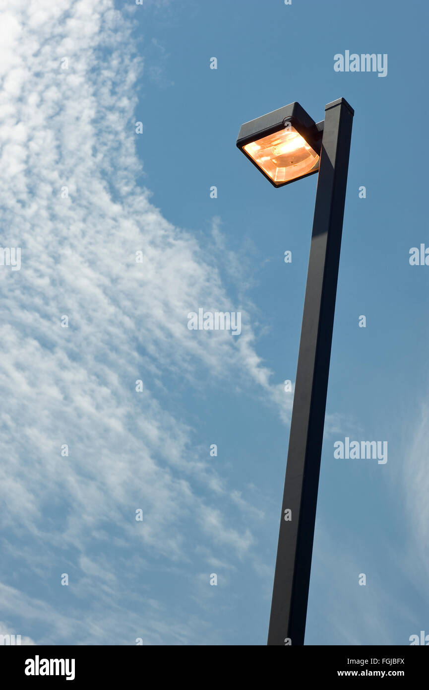 A Street LIght is On During the Day Wasting Energy Stock Photo Alamy