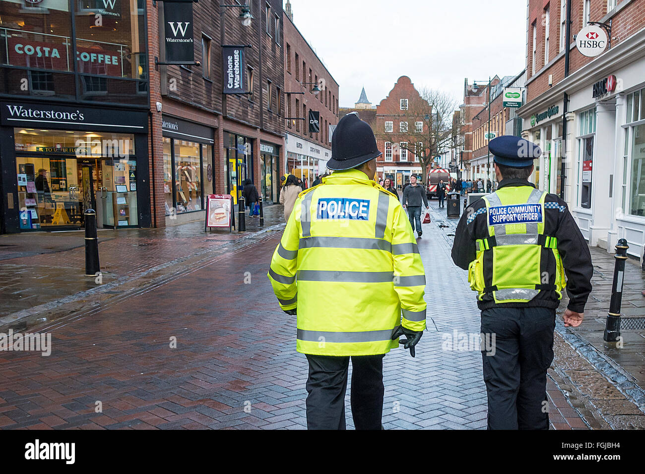 Police Officer and Police Community Support Officer on Foot Patrol Stock Photo
