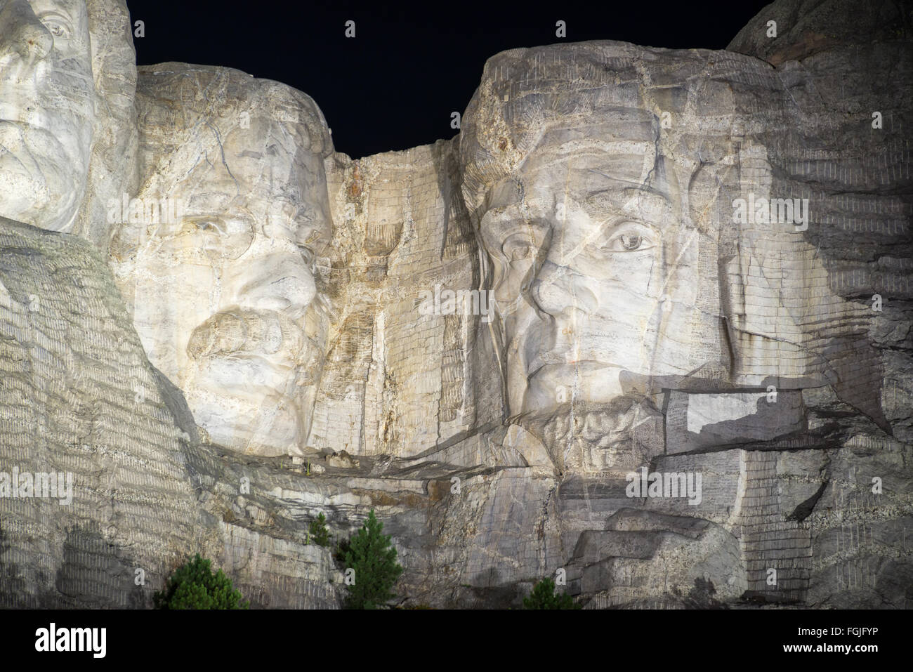 Mount Rushmore at night with Jefferson, Roosevelt, and Lincoln visible Stock Photo