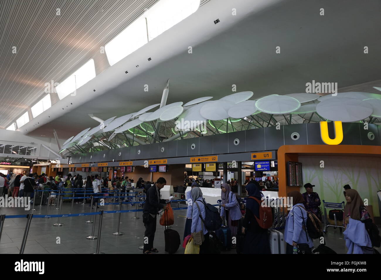 check in counters at KLIA2, the low cost carrier  terminal at Kuala Lumpur International Airport, operated by Malaysia Airports Stock Photo