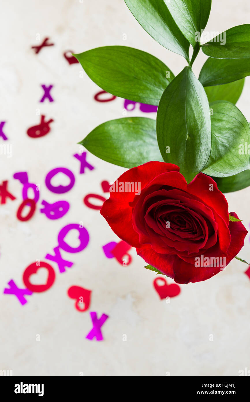romantic display on a kitchen counter with the letters xoxo spilled over  the counter Stock Photo - Alamy