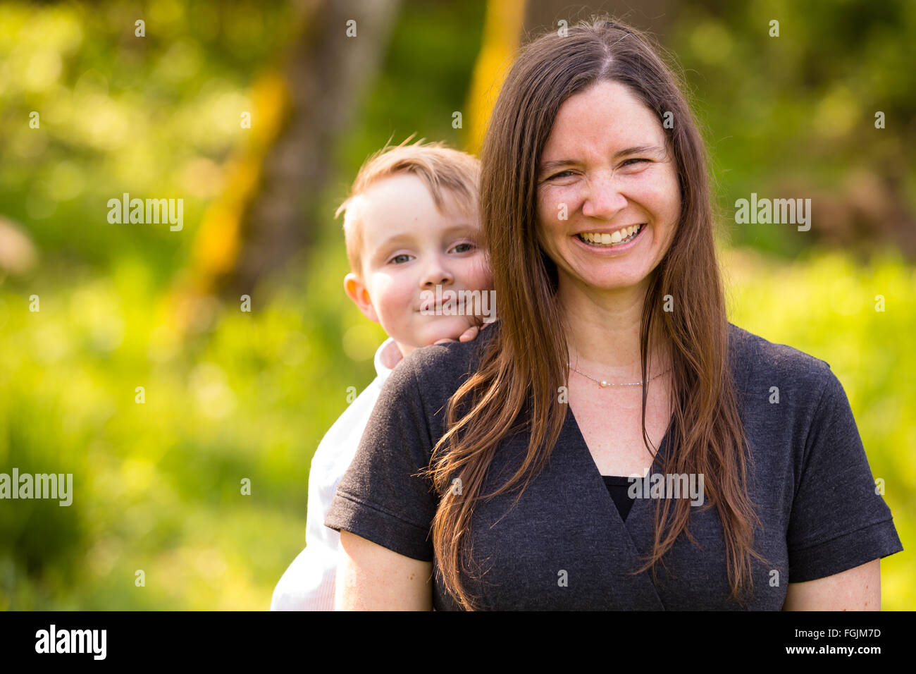 Lifestyle portrait of a mother and her son outdoors. Stock Photo
