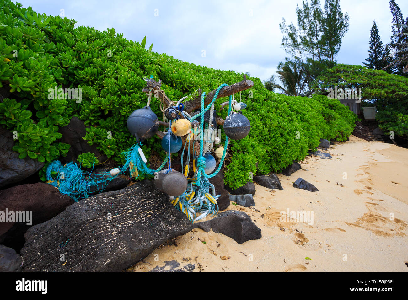 Nautical and marine floats and ropes wash ashore at Bathtub Beach on
