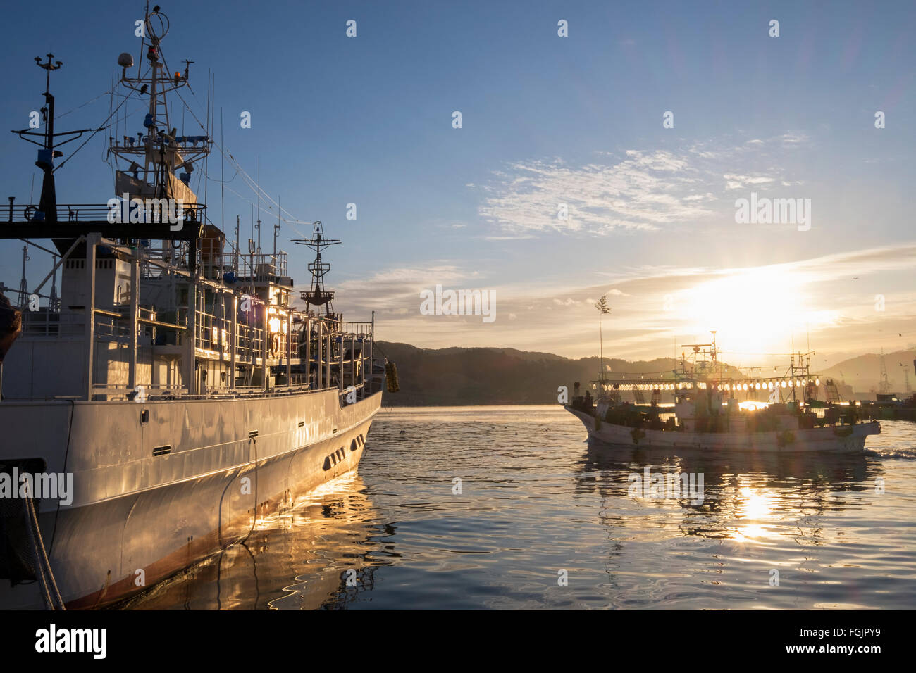 Fishing boats on the Kesennuma Harbour, in the Miyagi Prefecture, Japan which was destroyed during the 2011 earthquake, tsunami Stock Photo