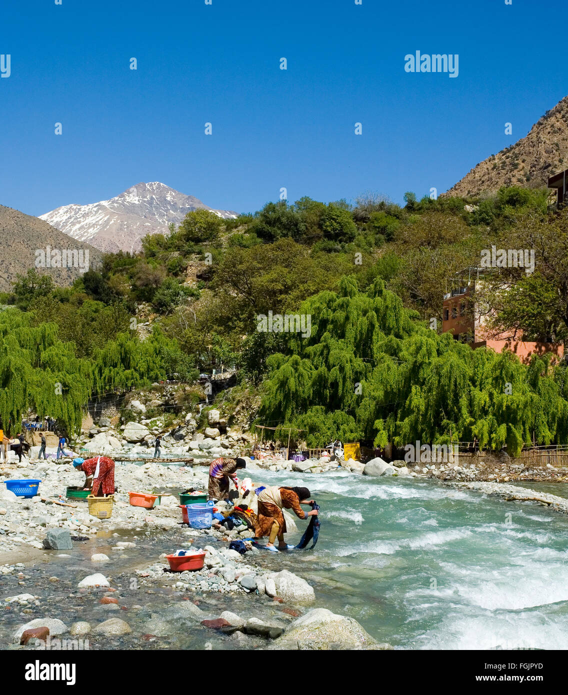 Washing Clothes in the river at Setti Fatma, Ourika Valley, Morocco near Marrakech Stock Photo