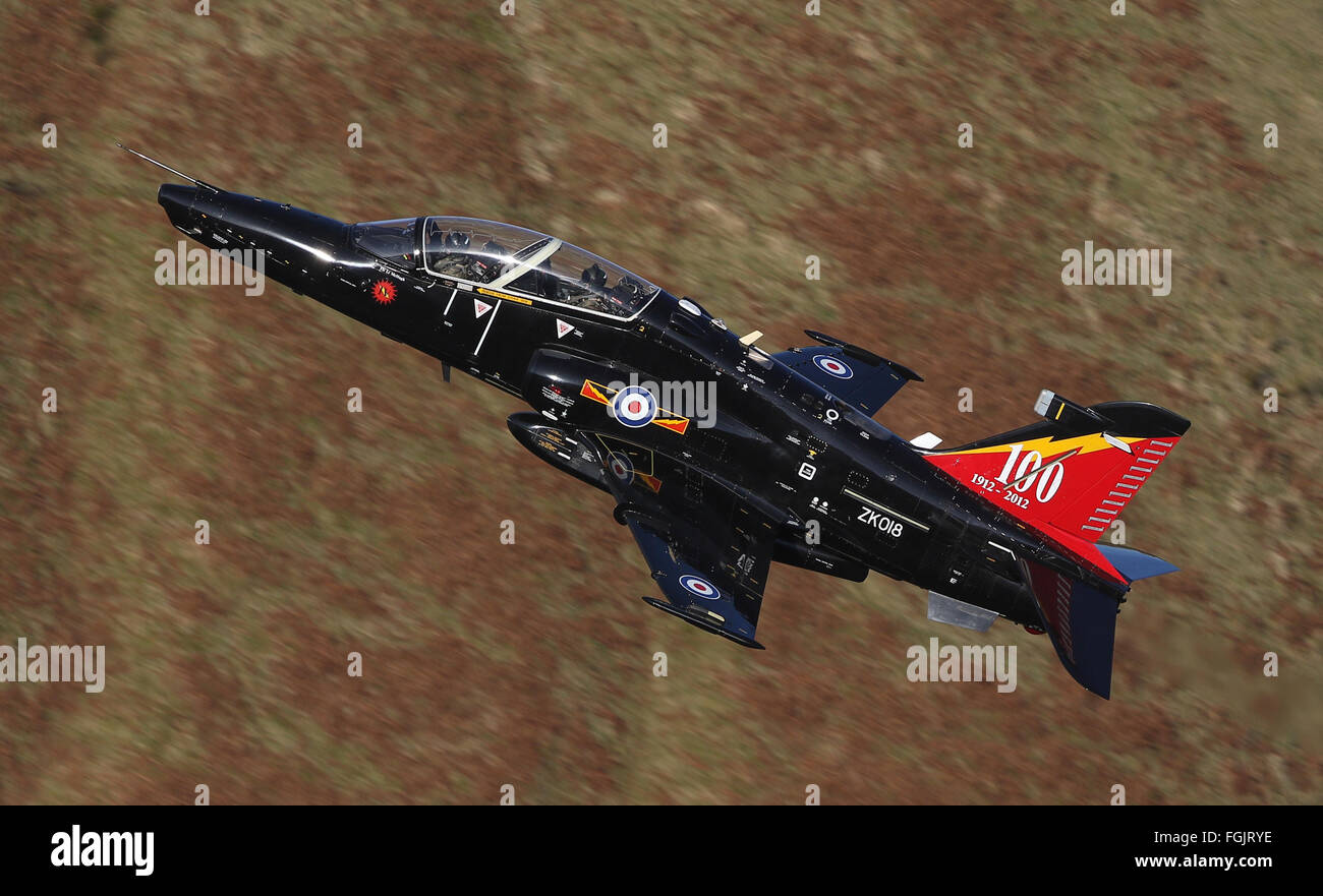 An RAF HAWK T2 training  jet exiting the Mach Loop at high speed and low altitude Stock Photo