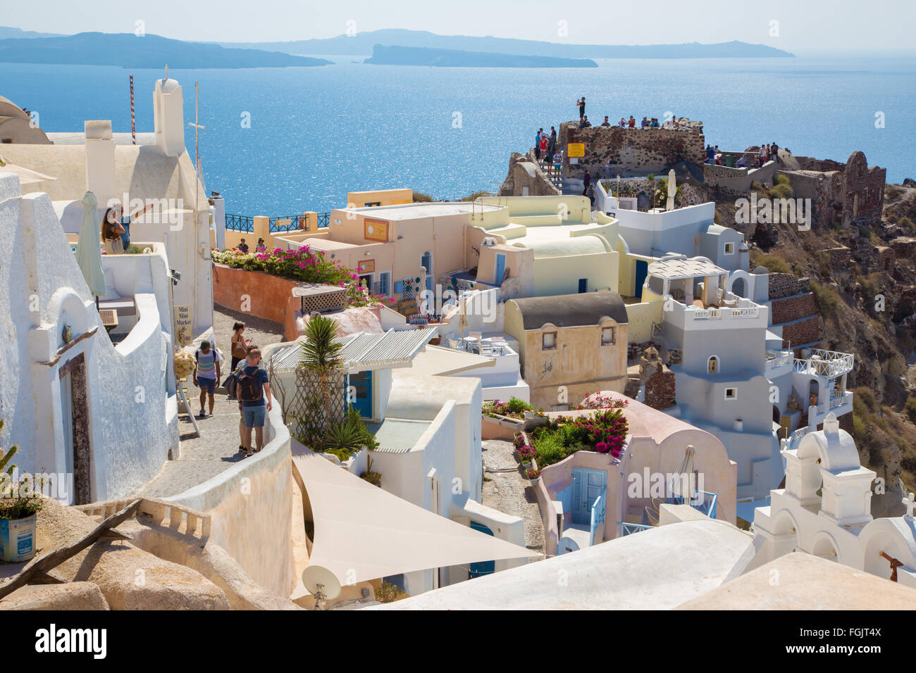 SANTORINI, GREECE - OCTOBER 5, 2015: The little ruins of fortress in Oia and Therasia island. Stock Photo