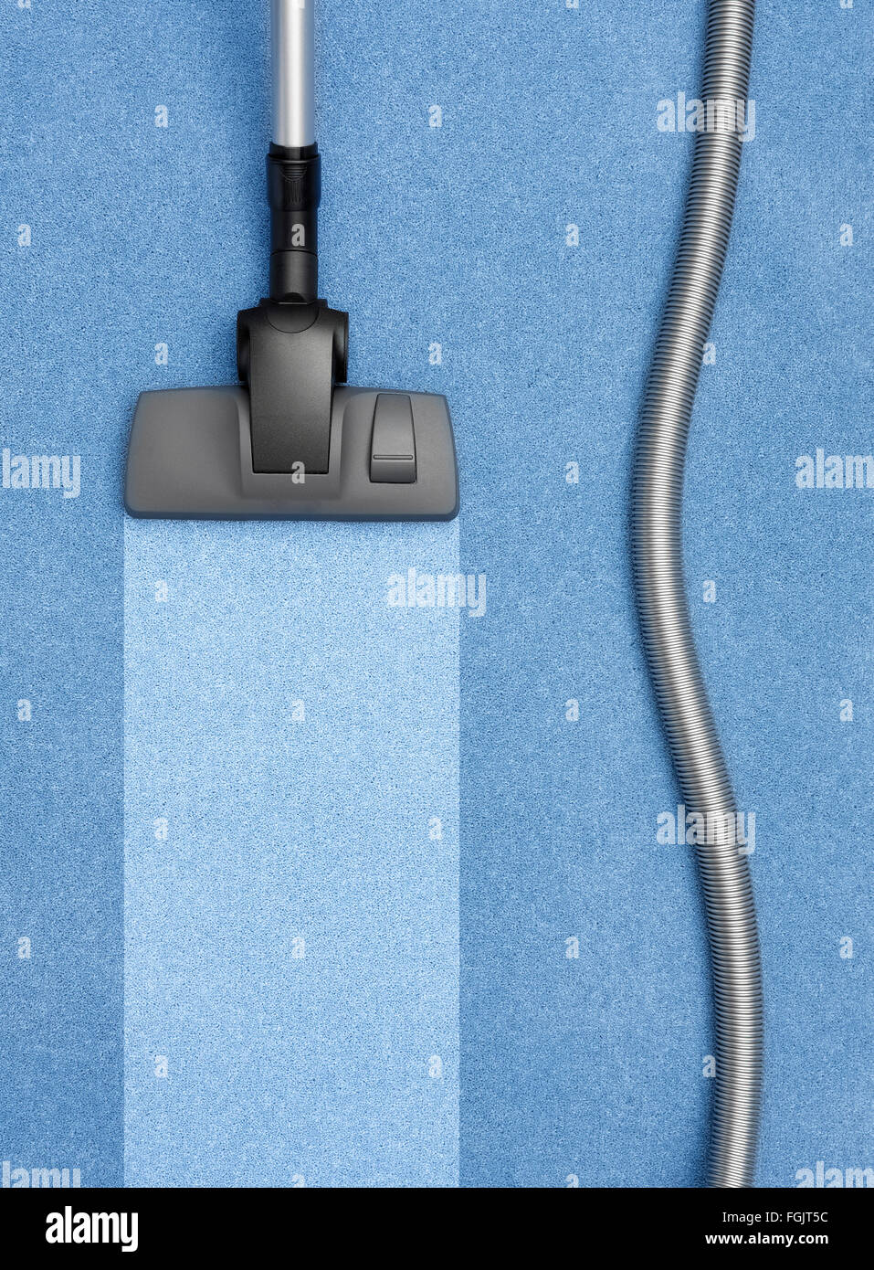 Vacuum Cleaner cleaning the carpet Stock Photo Alamy