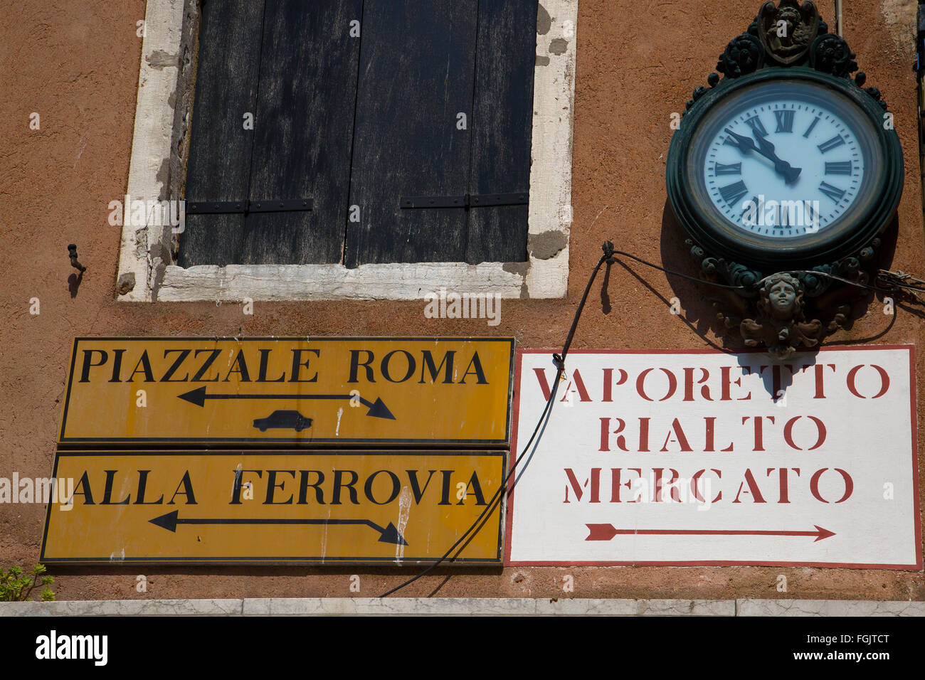 Confusing Street Signs on a wall in Venice, Italy Stock Photo Alamy