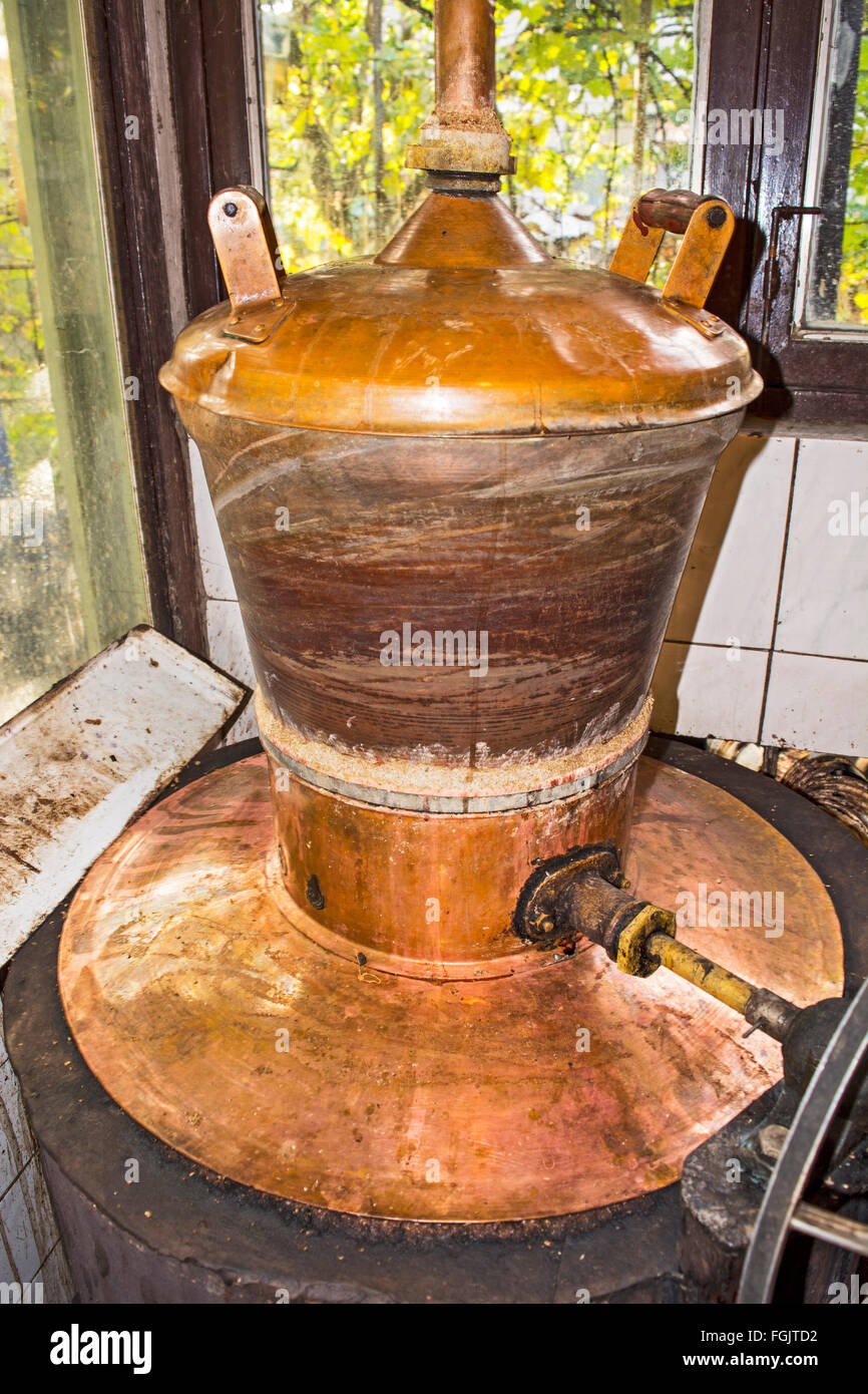The boiler for the production of home-made brandy Stock Photo