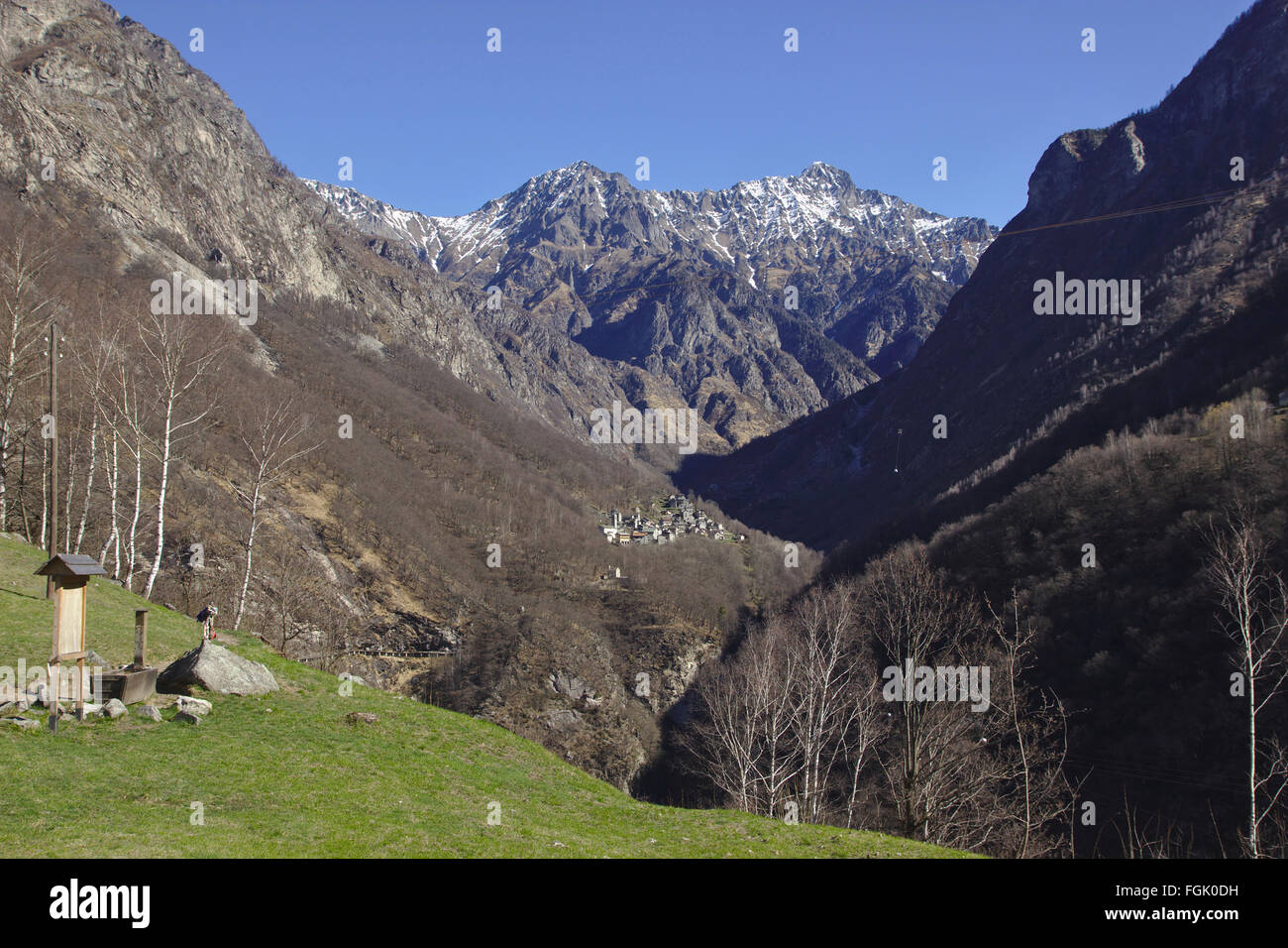 Valle dei Ratti with village Frasnedo in spring, Italy Stock Photo
