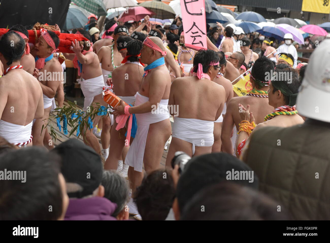 Participants Of The Naked Man Festival Are Arriving At The Main Gate Of participants-of-the-naked-man-festival-are-arriving-at-the-main-gate-of