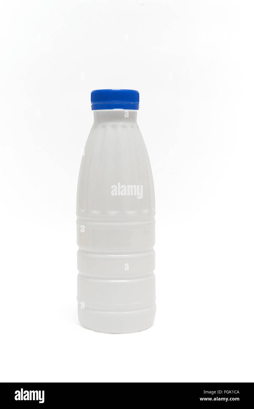 milk plastic bottle isolated on black background Stock Photo - Alamy