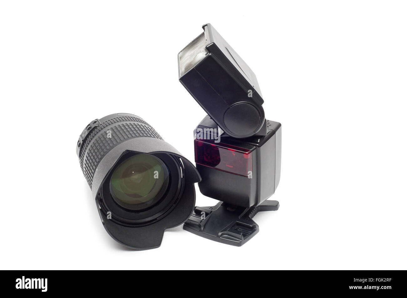 Flash and camera lens for dslr camera isolated on white background ...