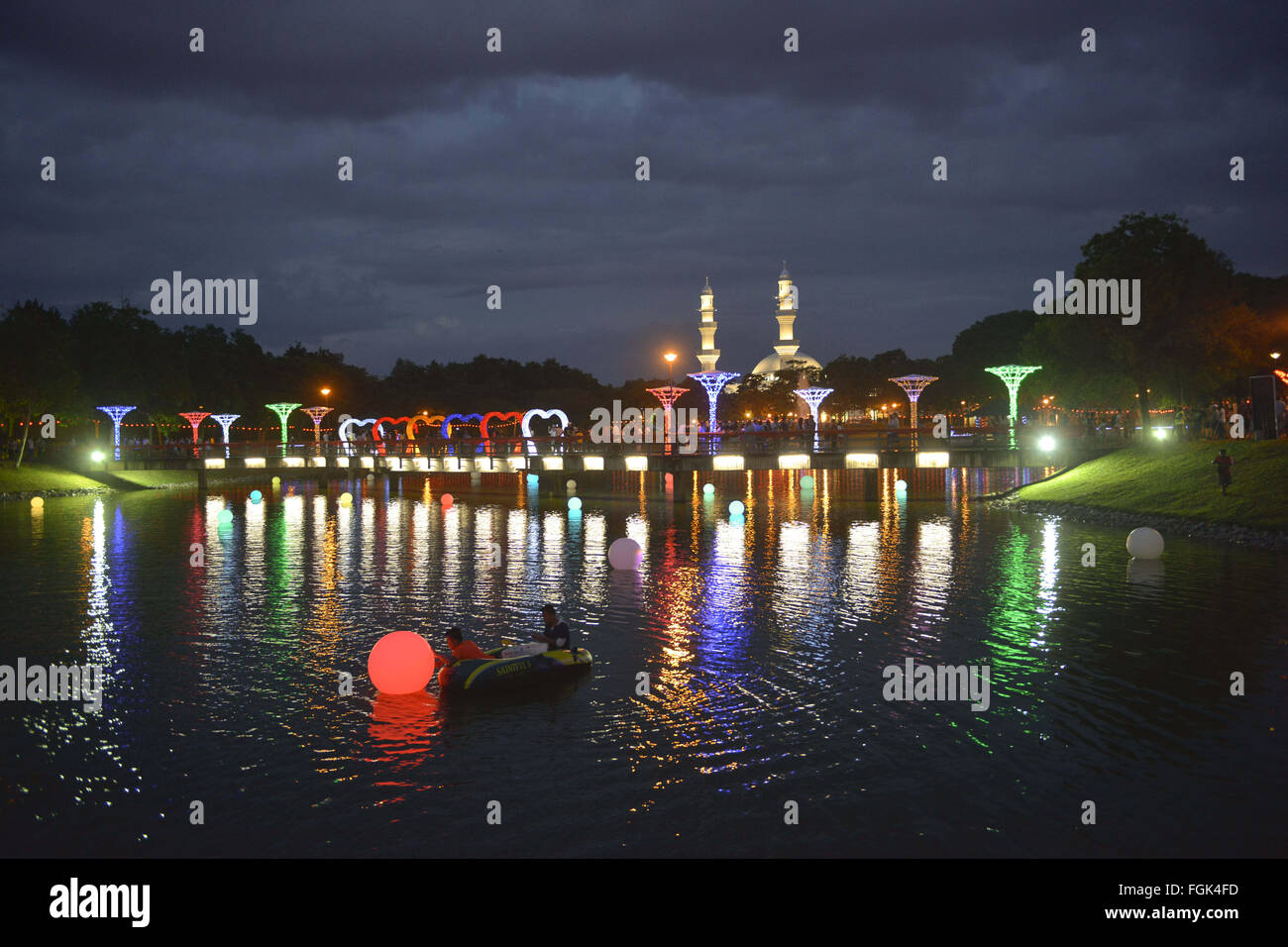 Seremban, Negeri Sembilan, Malaysia. 20th Feb, 2016. Workers light up the light decorations during Chap Goh Mei celebration in Seremban outside Kuala Lumpur Malaysia on 20 February 2016.Chap Goh Mei is the final day of Chinese New Year, also known as the Oriental Valentine's Day. Young maidens believed that by throwing mandarin oranges into the sea or a lake or pool would find themselves a good husband. © Kepy/ZUMA Wire/Alamy Live News Stock Photo