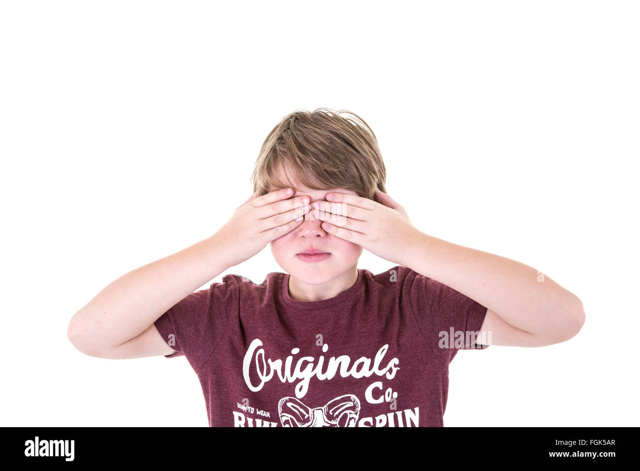 Young Boy Covers his Eyes on a white background Stock Photo - Alamy