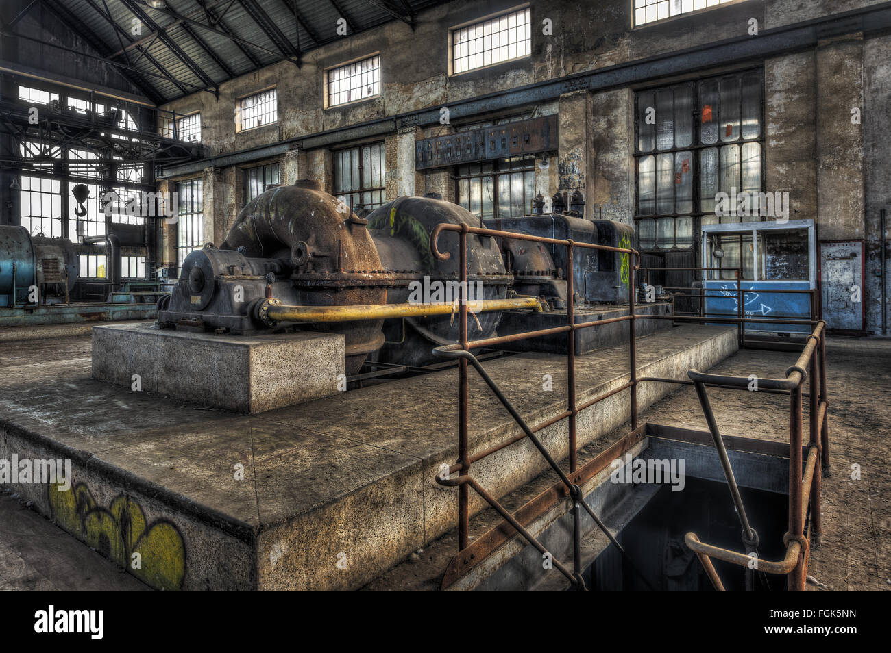 Old turbine in an abandoned power plant Stock Photo