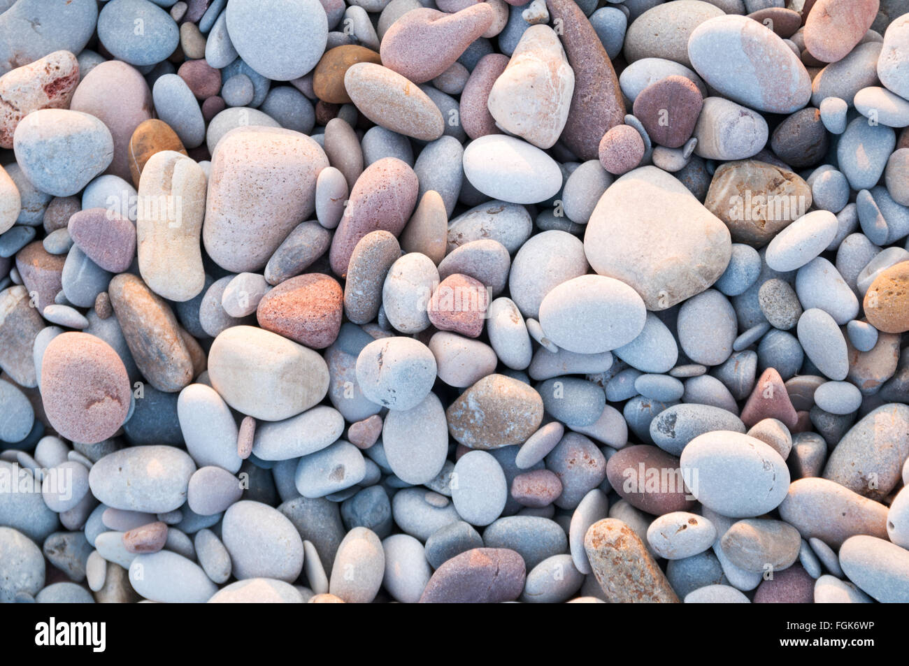 Full frame of colourful pebbles on a beach Stock Photo Alamy