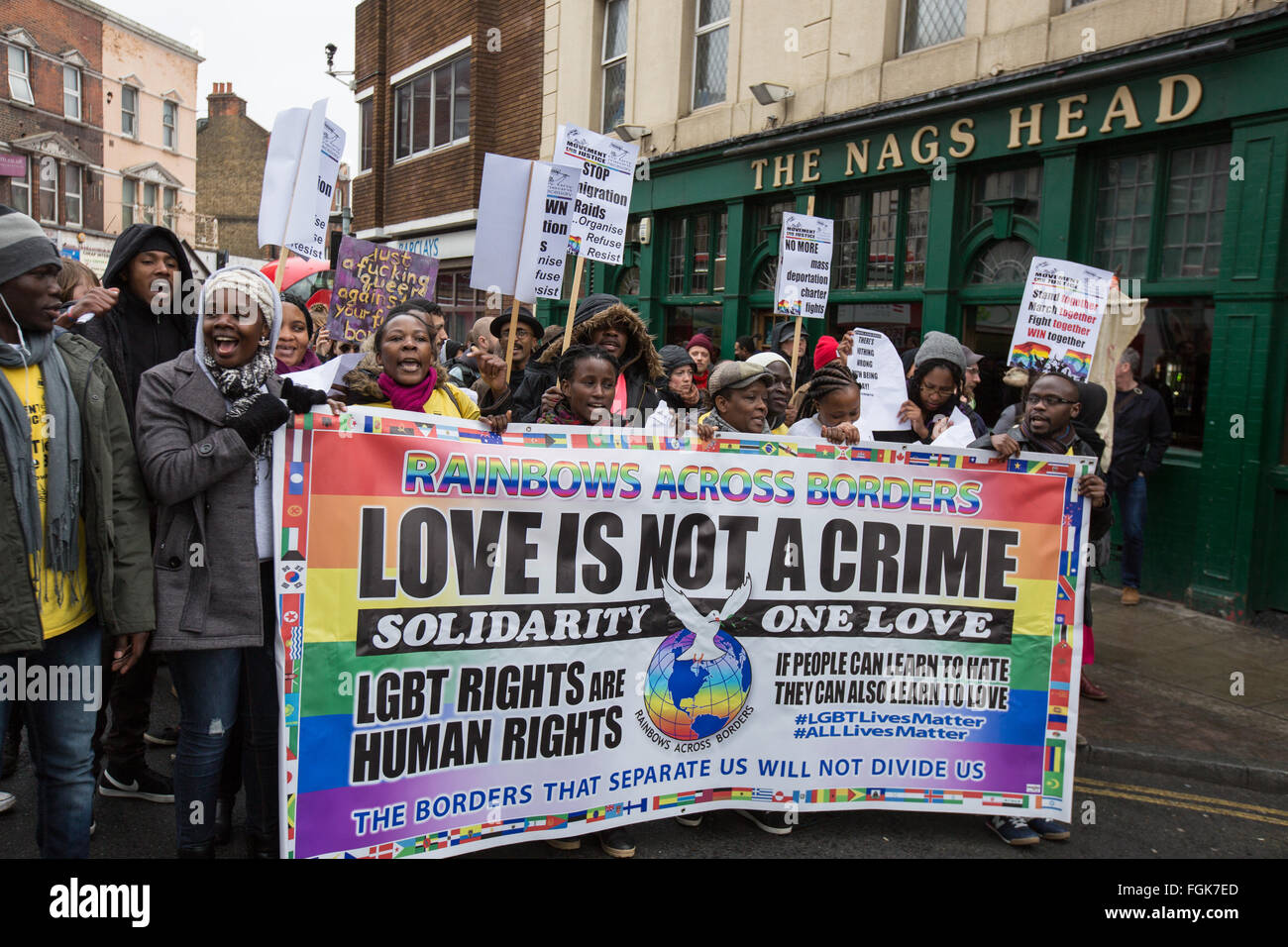 Peckham, London, 20 February 2016, 'Love is not a crime' the community pride march passing the Nags Head in Peckham. Credit:  David Rowe/Alamy Live News Stock Photo