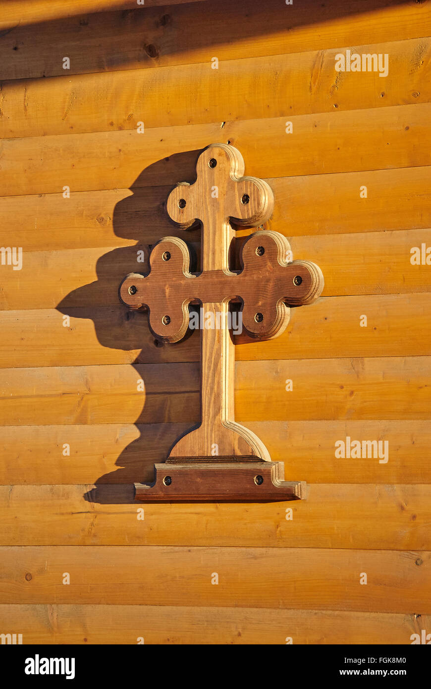Christian cross at the wooden wall of a rural church Stock Photo - Alamy
