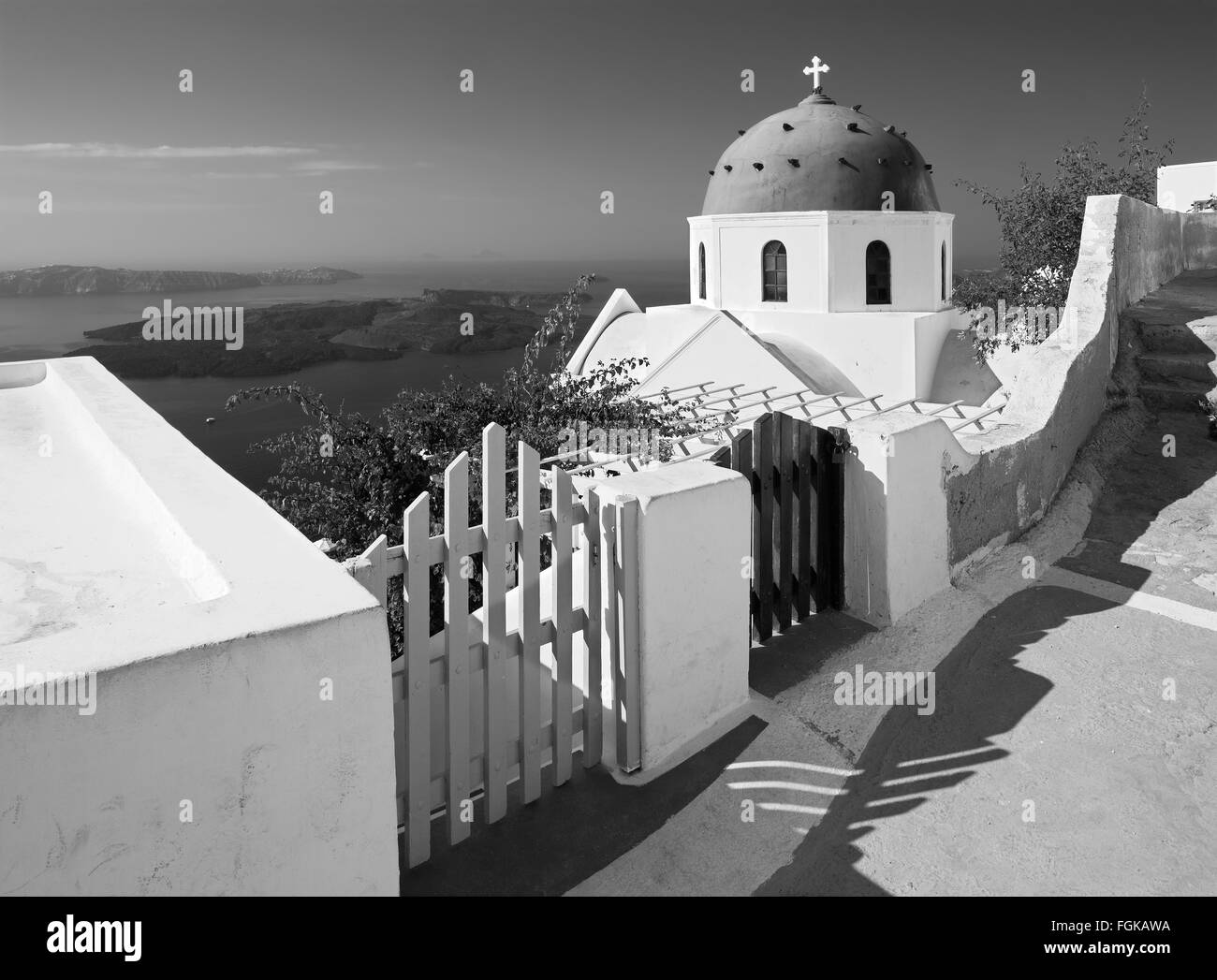 Santorini - The look to typically church cupolas in Imerovigli over the caldera in background. Stock Photo