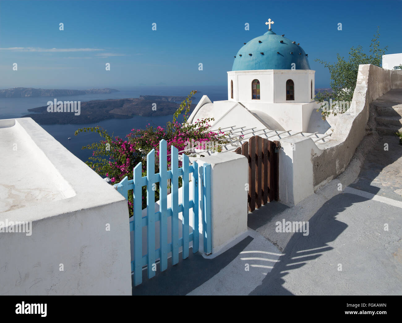 Santorini - The look to typically church cupolas in Imerovigli over the caldera in background. Stock Photo