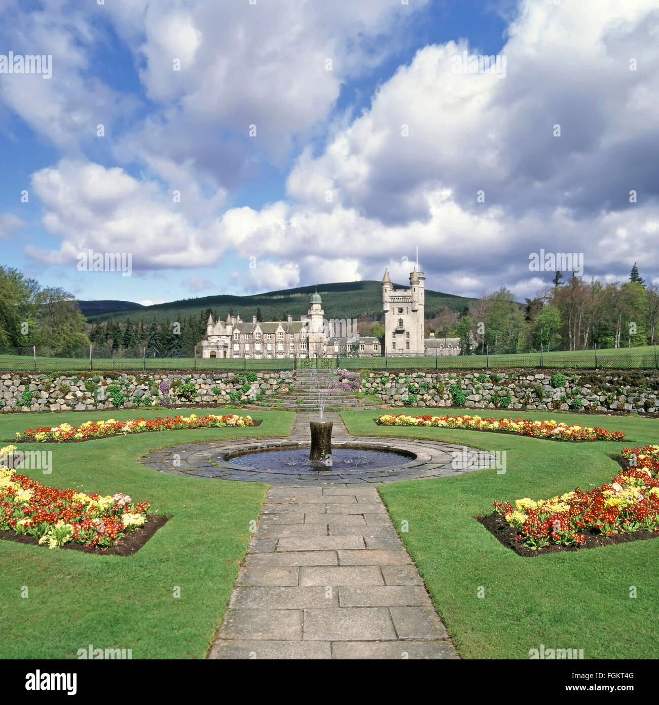 Victorian Balmoral Castle Royal Estate House & garden landscape with small fountain near village of Crathie Royal Deeside Aberdeenshire Scotland UK Stock Photo