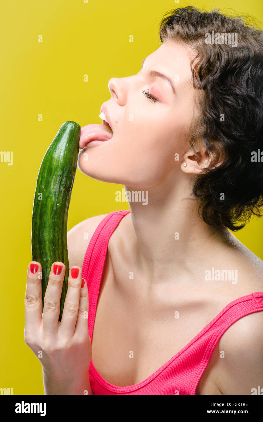 Girl with cucumber