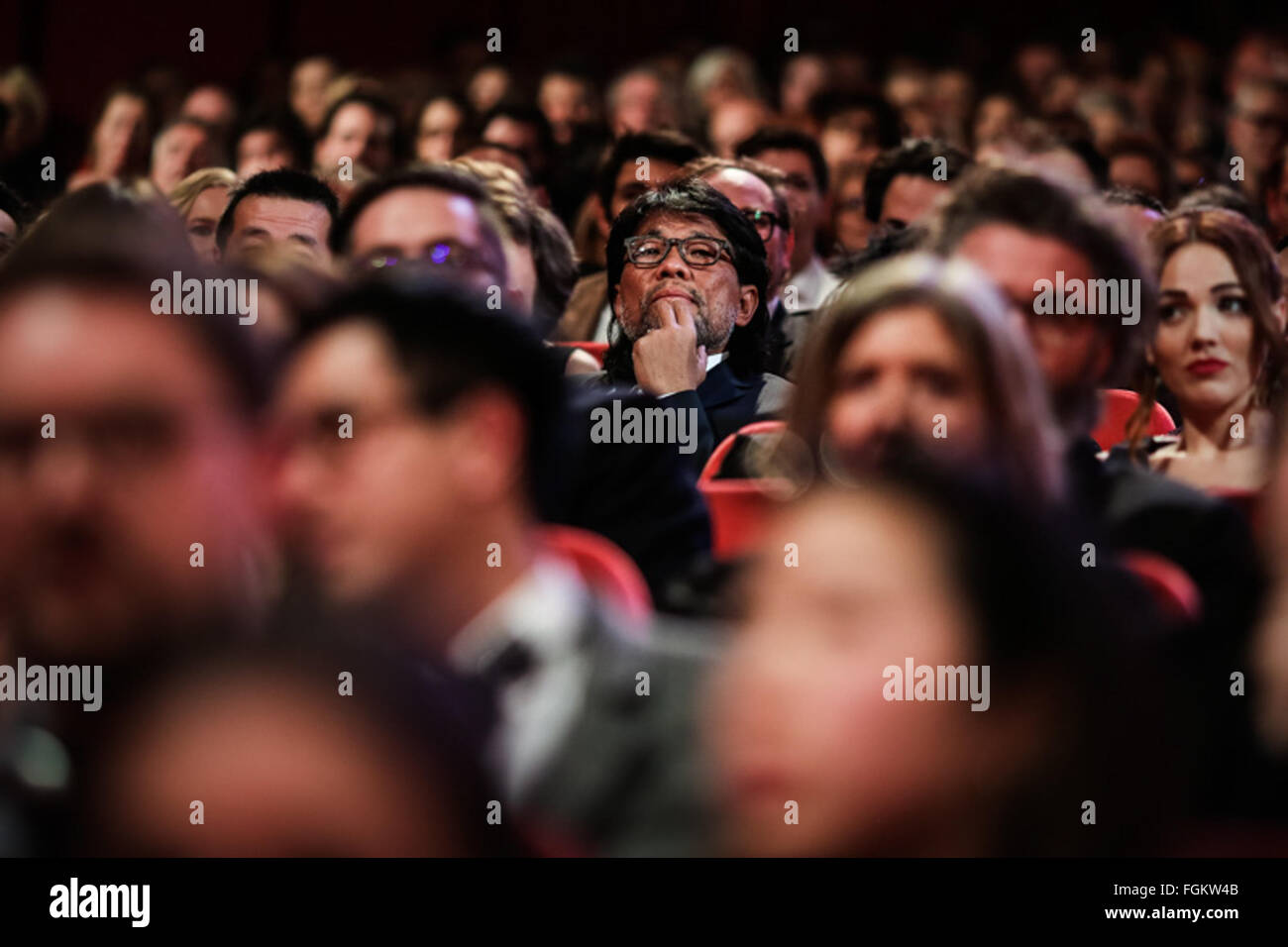 Berlin, Germany. 20th Feb, 2016. Mark Lee Ping-Bing (C), Cinematographer of the movie "Crosscurrent" (Chang Jiang Tu), attends the awards ceremony of the 66th Berlinale International Film Festival in Berlin, Germany, Feb. 20, 2016. © Zhang Fan/Xinhua/Alamy Live News Stock Photo