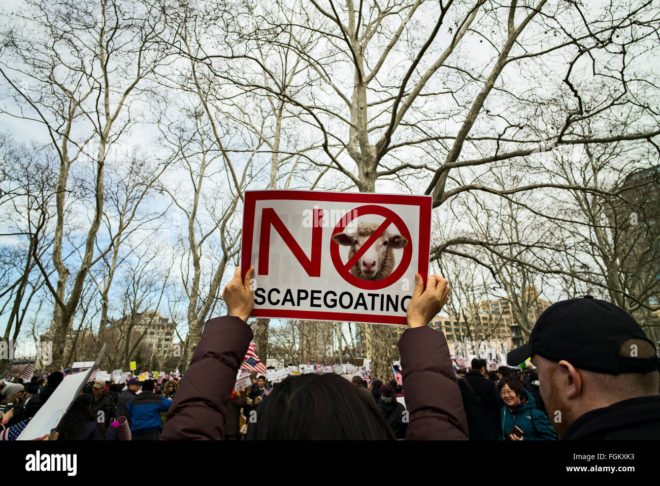 Brooklyn NY, US, February 20, 2016:  A woman holds a sign reading 'No scapegoating' during a demonstration against the conviction of former New York City police officer Peter Liang, who was found guilty of manslaughter and official misconduct in the 2014 shooting death of a black man in a housing project. Stock Photo