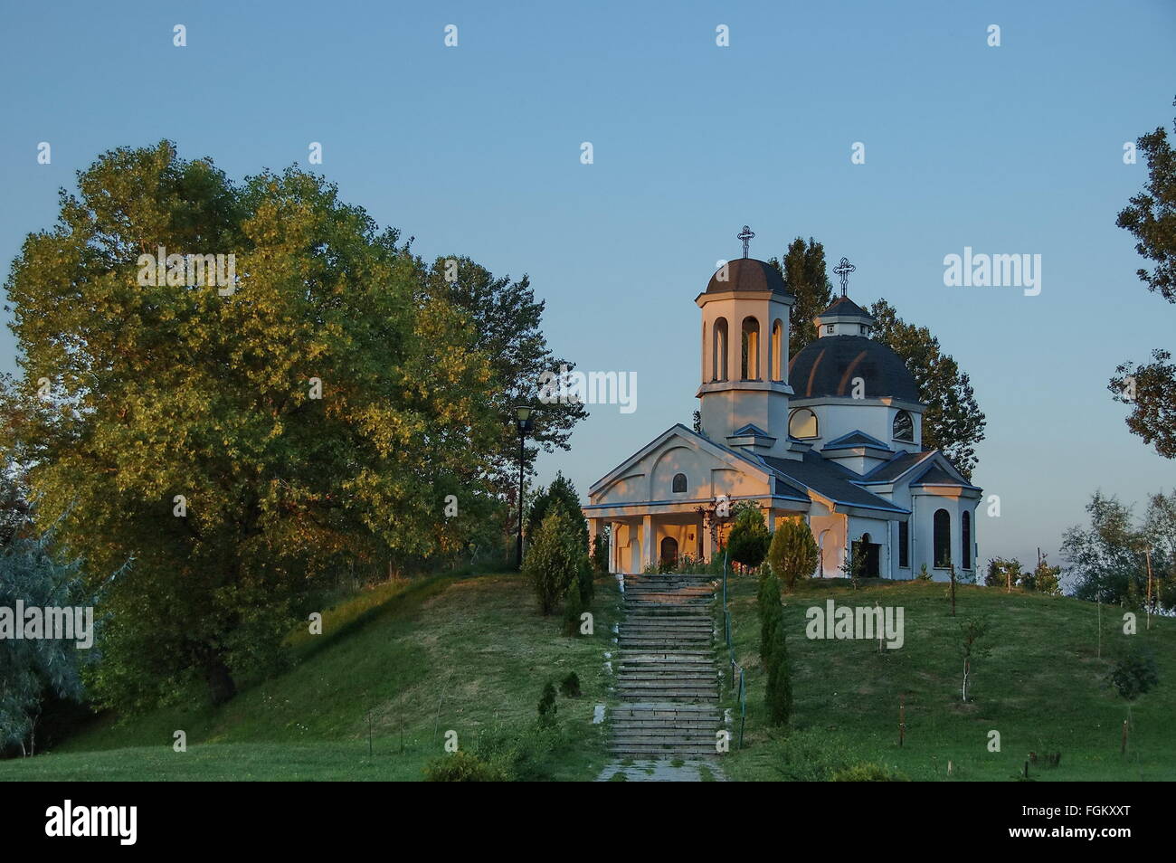 Small dam and christian church in the residential district Drujba ...
