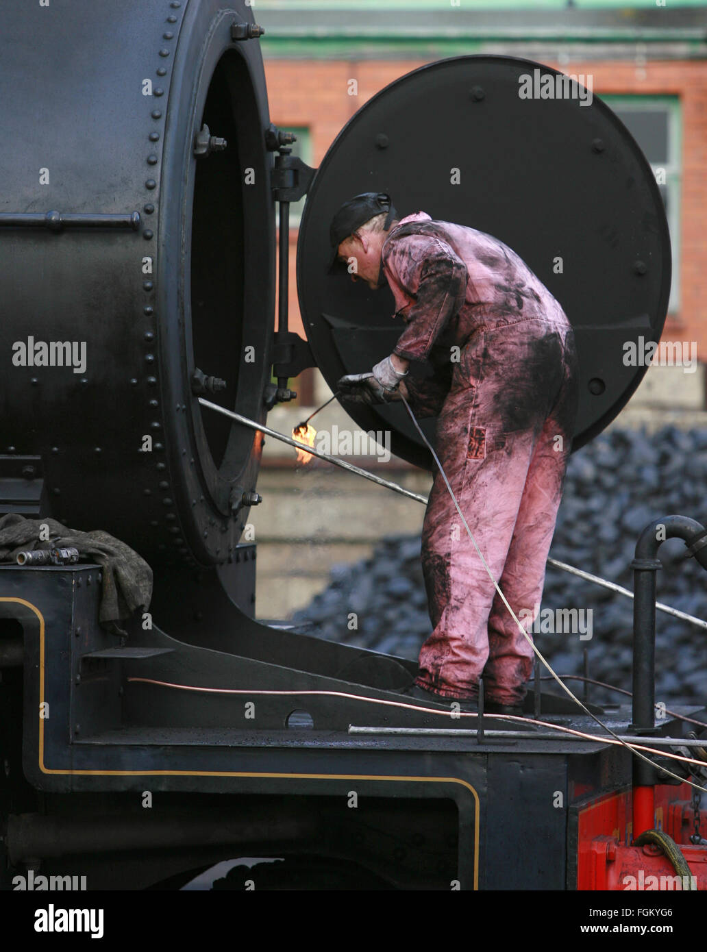 Railway enthusiast,Minehead,Somerset,going back to steam.run and repair, Stock Photo