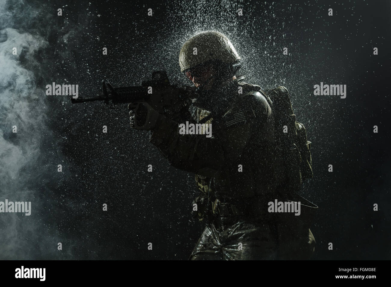 US Army soldier in the rain Stock Photo