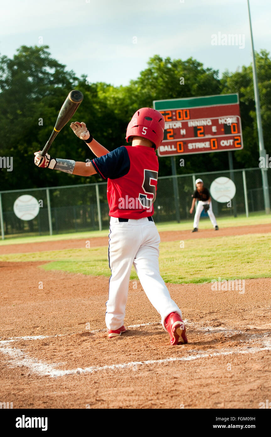 Little league american baseball kid batting Stock Photo