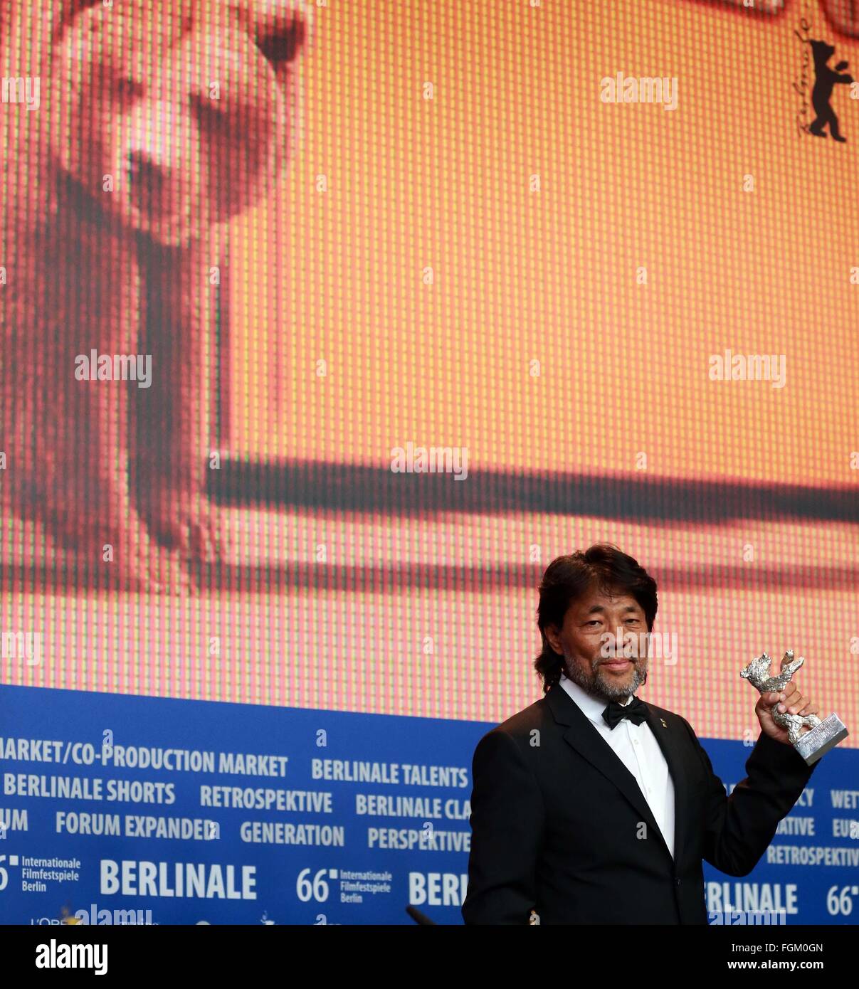 Berlin, Germany. 20th Feb, 2016. Mark Lee Ping-Bing, cinematographer of the movie 'Crosscurrent' (Chang Jiang Tu), attends a press conference after receiving his Silver Bear for Outstanding Artistic Contribution at the awards ceremony of the 66th Berlinale International Film Festival in Berlin, Germany, Feb. 20, 2016. © Luo Huanhuan/Xinhua/Alamy Live News Stock Photo