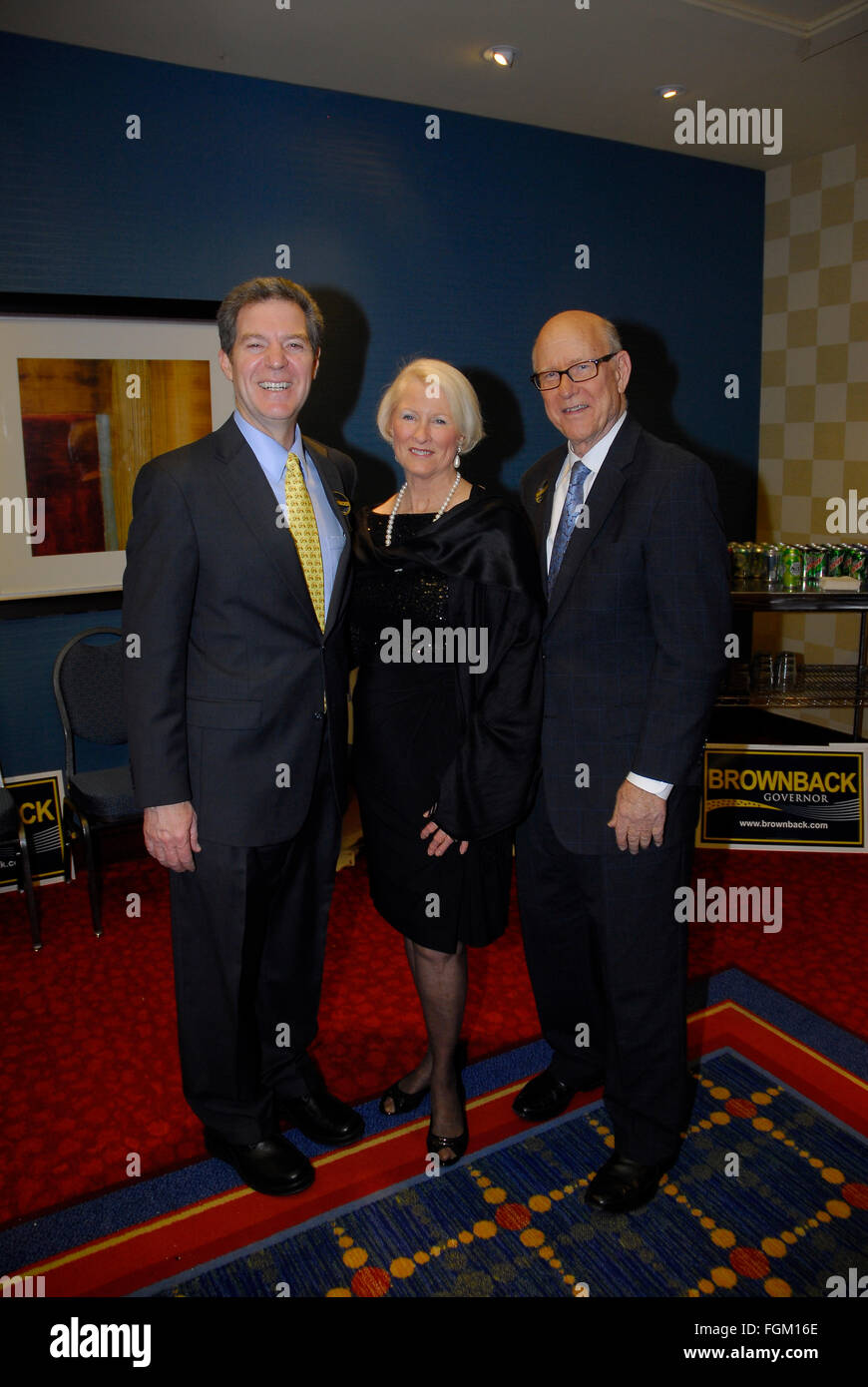 Overland Park,  Kansas, USA, 19th February, 2016 Governor Sam Brownback greets US Senator Pat Roberts and his wife Frankie at his reception during the Republican convention   Credit:  mark reinstein/Alamy Live News Stock Photo