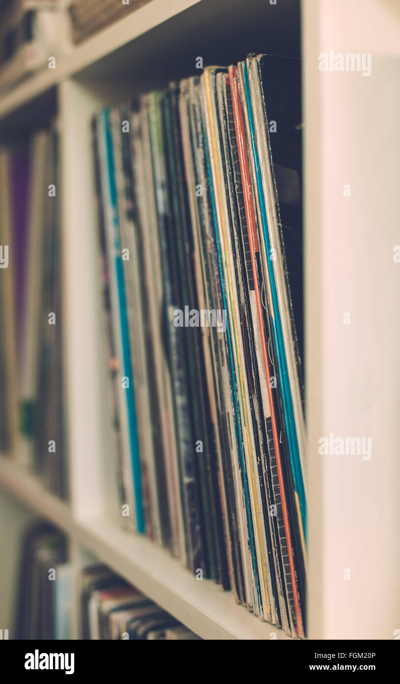Vintage 33 vinyl long playing row on shelf selective focus vertical Stock Photo