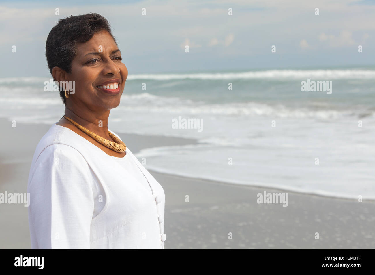 Black woman on a beach hi-res stock photography and images - Alamy