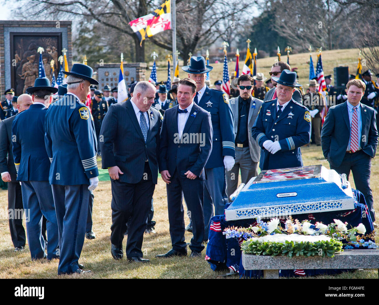 Feb. 20, 2016 - Timonium, Maryland, U.S. - February 20, 2016 : Maryland Governor Larry Hogan, 3rd from left, talks with Harford County Executive Barry Glassman as they view a specially made burial vault top before the funeral for Harford County Deputy First Class Mark Logsdon at Dulaney Valley Memorial Gardens in Timonium, Maryland. This was the second of two funeral for the deputies killed on February 10th in an incident that started at a Panera bread location in Abingdon, Maryland. These were the first police deaths by gunfire for the Harford County Sheriff's Office since 1899. Scott Serio/E Stock Photo