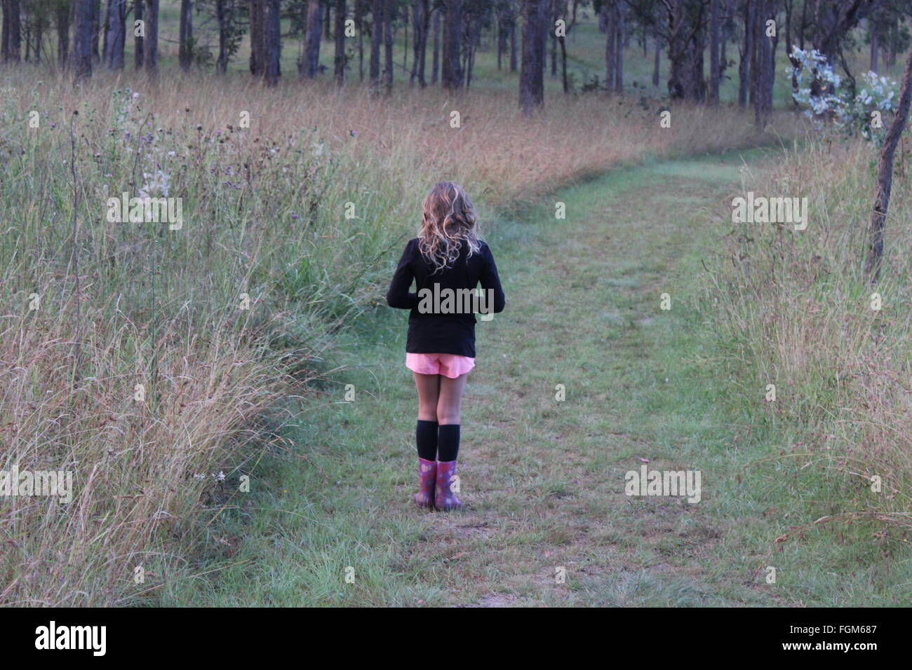 Girl on pathway hi-res stock photography and images - Alamy