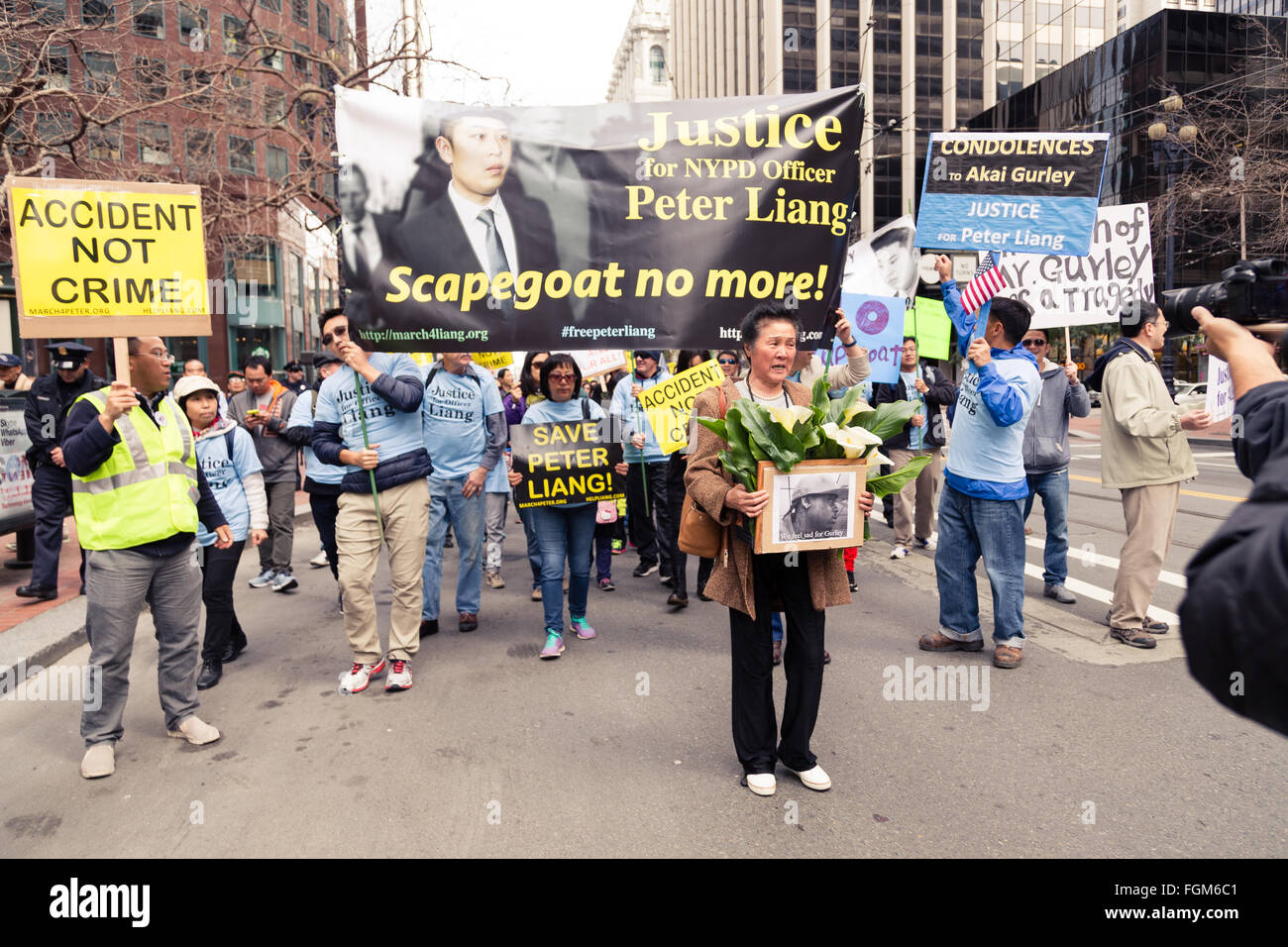 San Francisco, USA. 20th Feb, 2016. Chinese Woman Protester Mourns Over Akai Gurley Credit:  Alexander Zhu/Alamy Live News Stock Photo