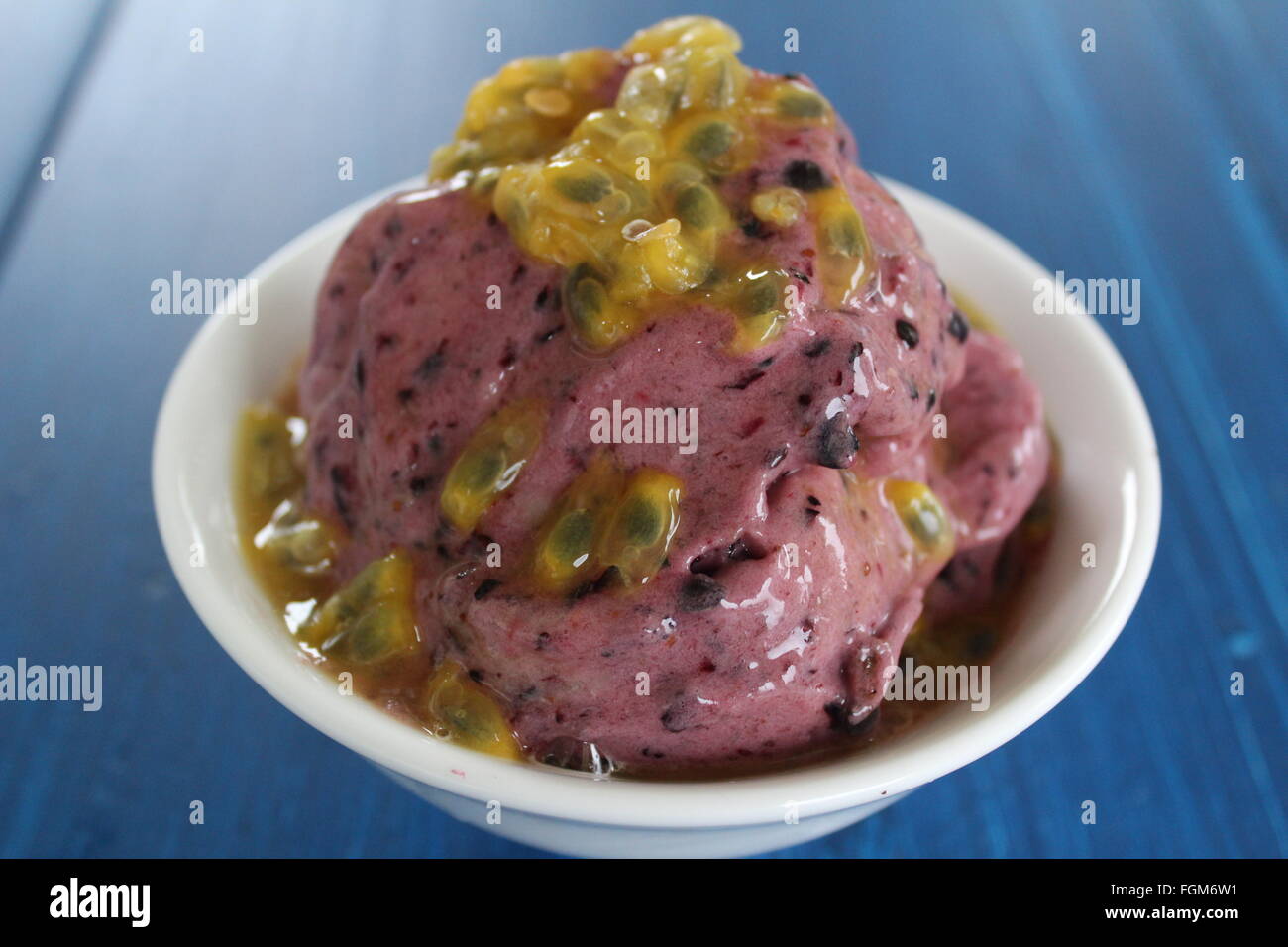 Blueberry and Banana Nice Cream with Passion fruit Stock Photo