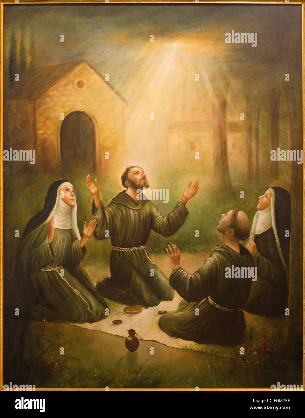 CORDOBA, SPAIN - MAY 27, 2015: The St. Francis of Assisi and St. Clara at prayer. Paint from 20. cent. by unknown artist. Stock Photo