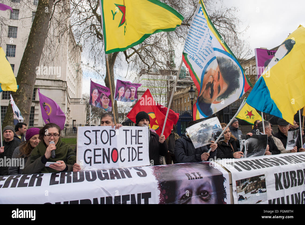 Kurdish people protest outside the Downing Street, London, UK. 10th February, 2016.  Placard: 'Stop The Genocide' Stock Photo