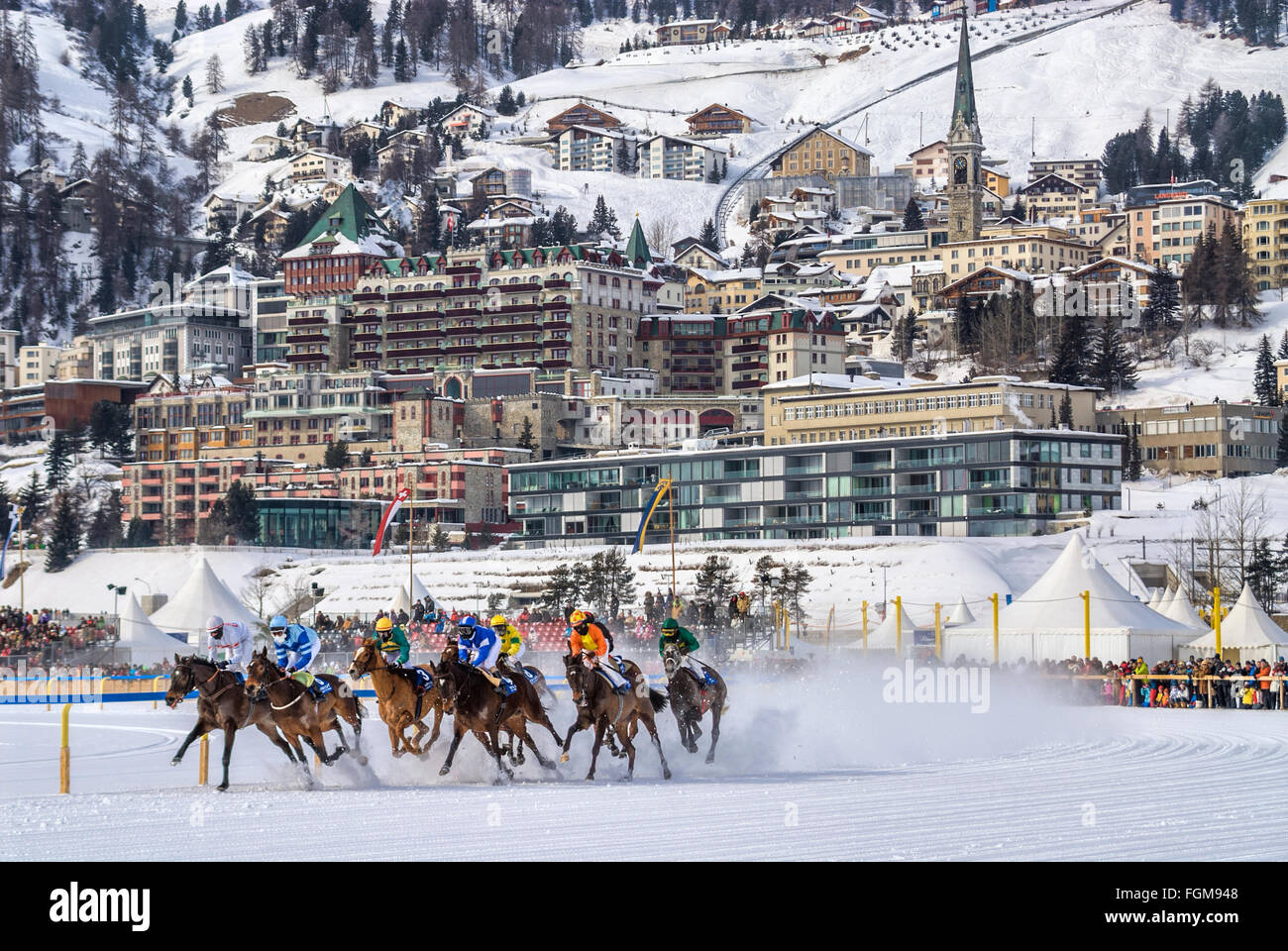 White Turf 2014 horse race in front of St.Moritz Dorf, Switzerland Stock Photo