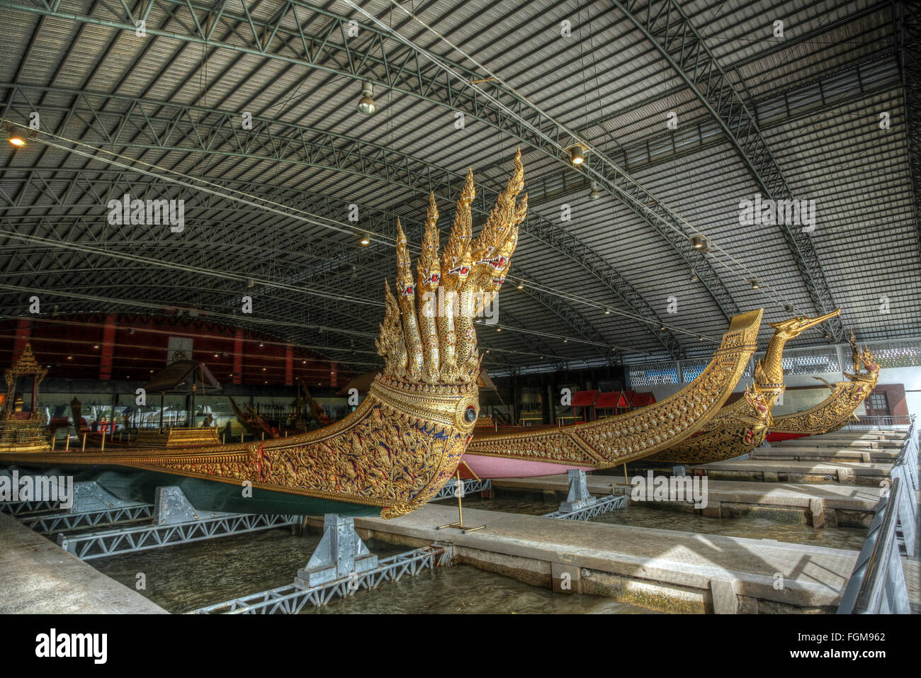 Dragon boats, royal barges of the Thai King, Royal Barges National Museum, Bangkok, Thailand Stock Photo
