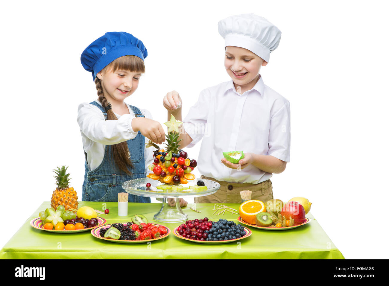 Children making fruit snacks Stock Photo - Alamy