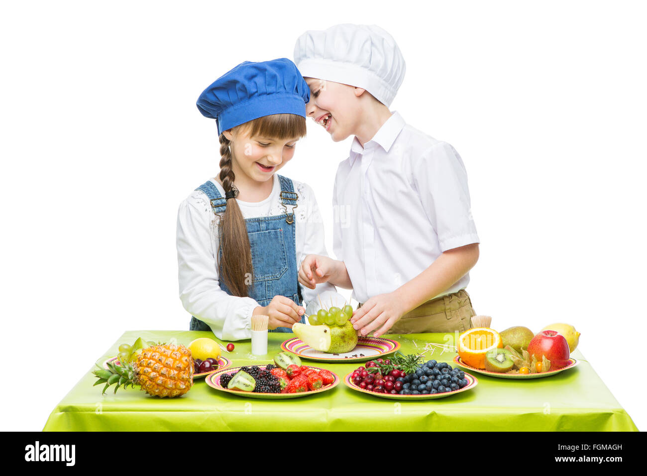 Children making fruit snacks Stock Photo - Alamy