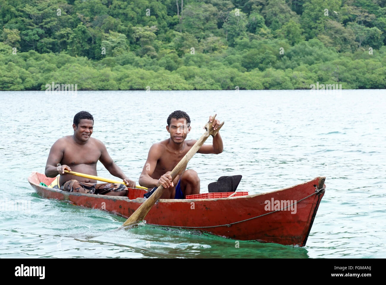 ngobe bugle man in canoe isla Bastimentos Bocas del toro Panama.The Ngäbe an indigenous people within the territories of present-day Panama,Costa Rica Stock Photo
