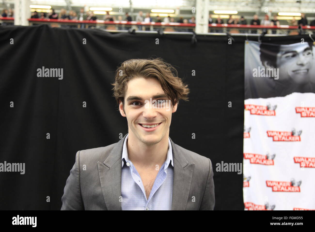 RJ Mitte breaking bad actor TV star Walt Junior in London, UK. 21st February, 2016. Walking Dead Convention Walker Stalker Con Olympia London 21/02/2016  London, UK. 21st February, 2016. Walking Dead Convention Walker Stalker Con Olympia London 21/02/2016 walking dead fans gather to see stars of the show and stalls selling everything to do with the hit zombie American show photo ops with a star or zombie. cosplayers & undead walkers roaming the event floor entertaining the crowds. Stalls selling make-up and characters from the show. Credit:  Paul Thompson/Alamy Live News Stock Photo